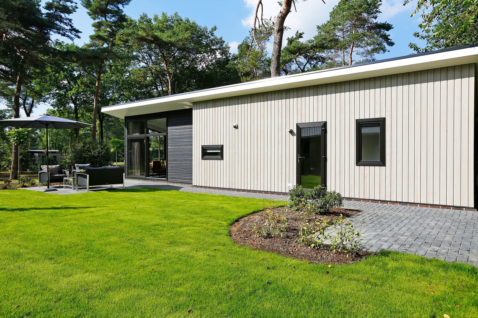 Bos Lodge voor zes personen op Bospark Markelo